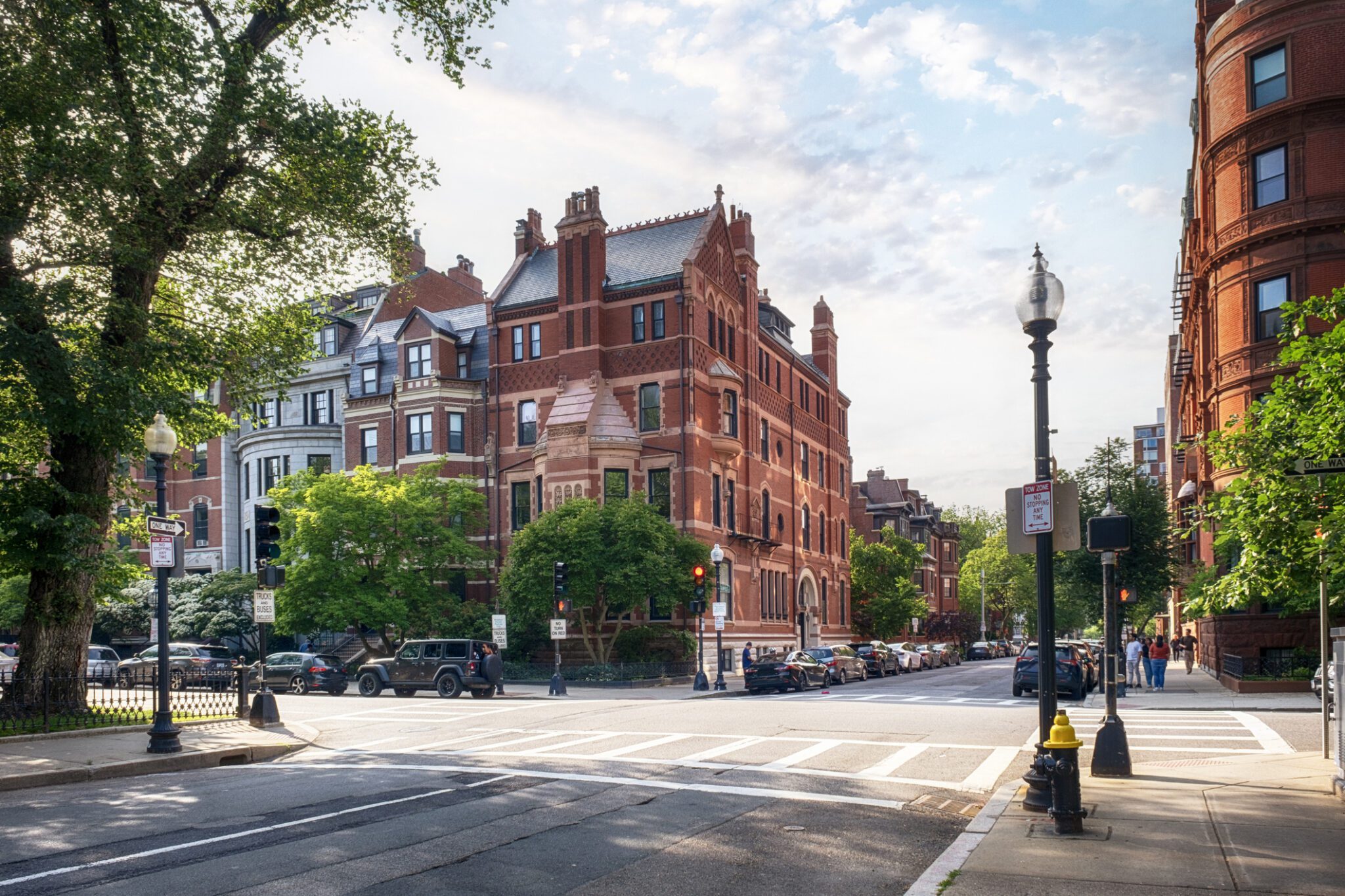 Historic red brick building on city street